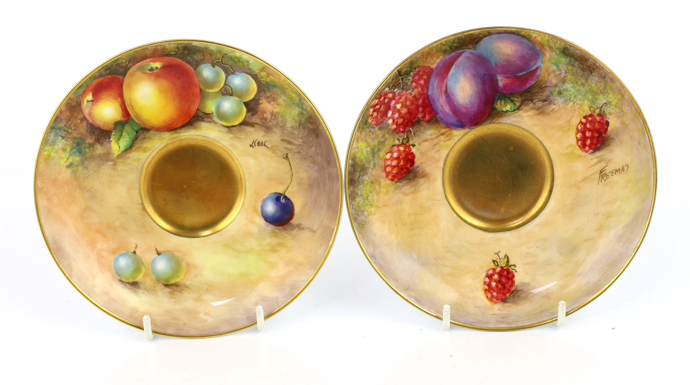 A pair of Royal Worcester fruit painted tea cups and saucers, 1960s